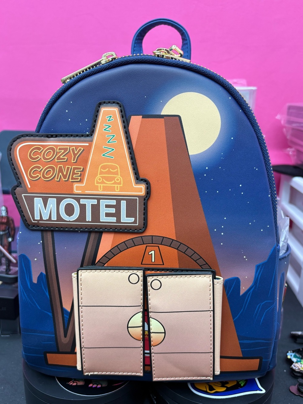 Loungefly Disney Pixar Cars Cozy Cone Motel Glow-in-the-Dark Mini Backpack
